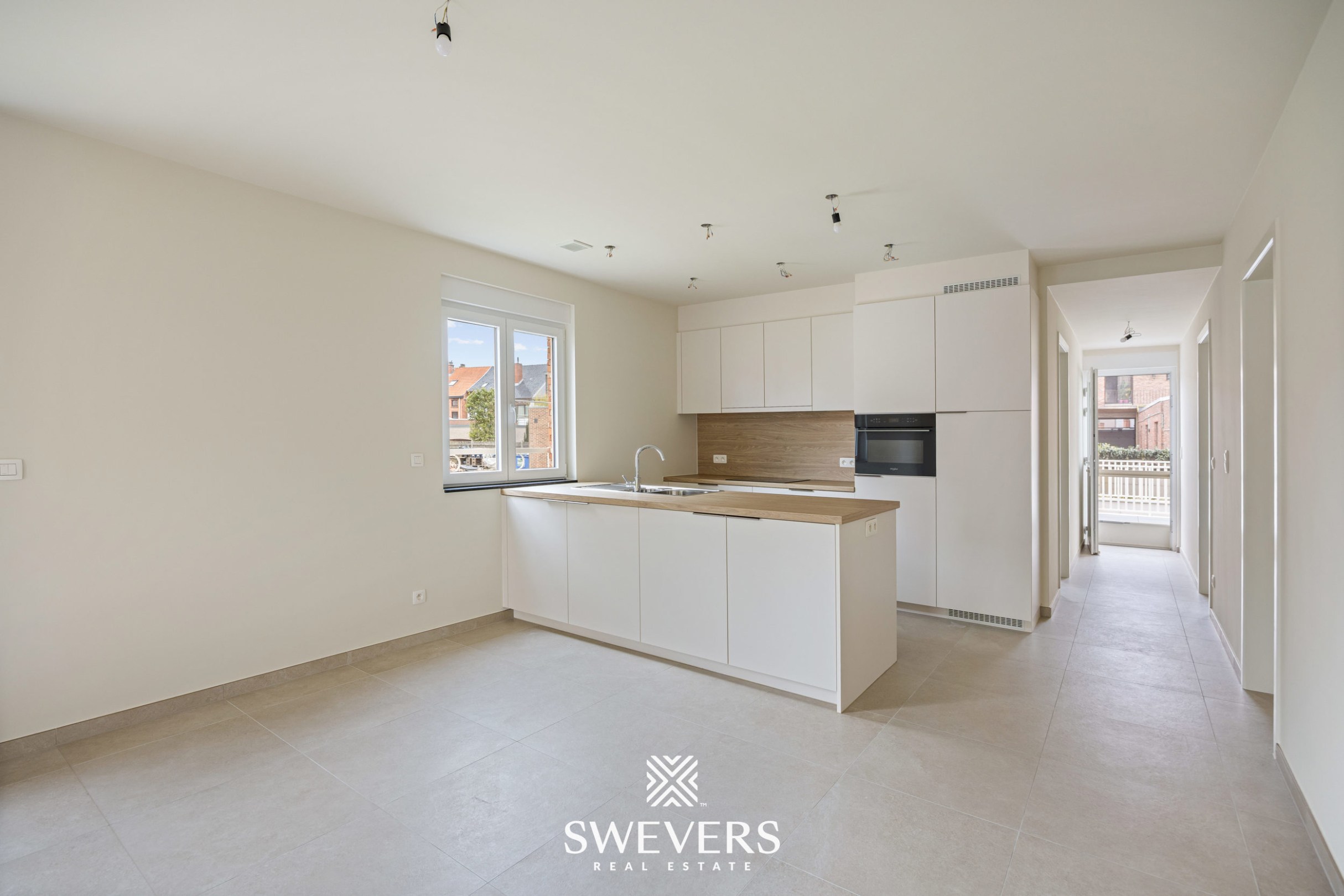 Modern gelijkvloers appartement met privétuin en dubbele parking - foto 4