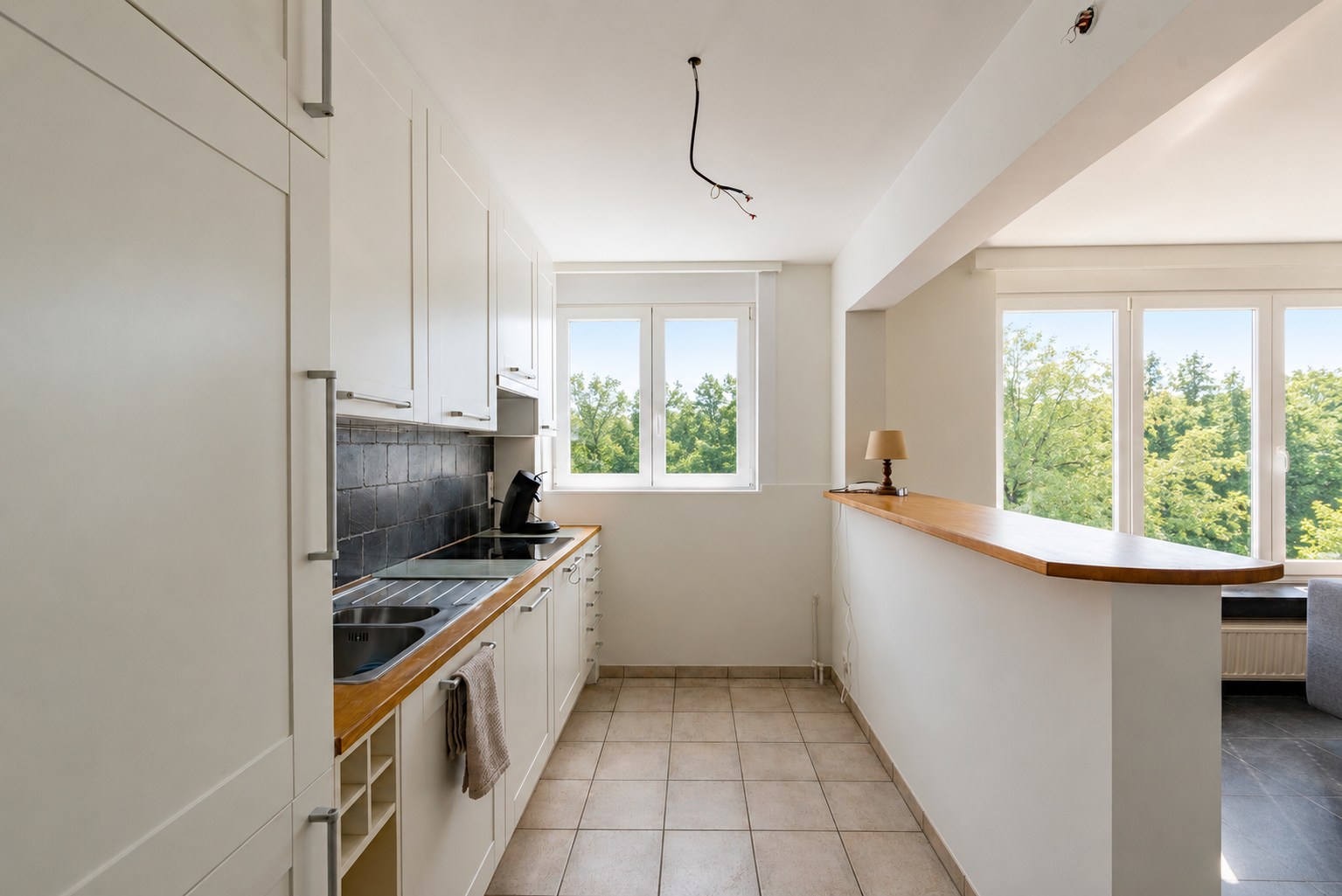 Vernieuwd appartement met 2 slaapkamers - foto 4