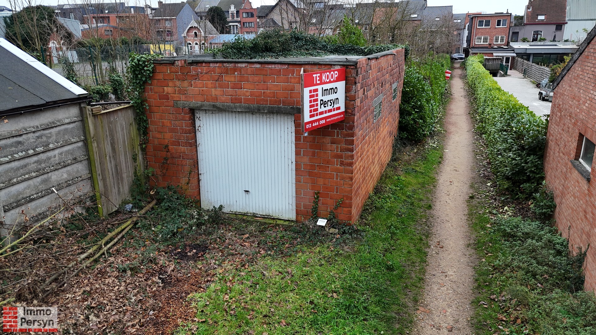 Rustig gelegen garage met grond en potentieel voor stadstuin in de Rozenstraat - foto 2