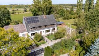 <p><strong>Looking for space, tranquility, and character in a prime location?</strong><br />This unique property, set on a generous <strong>53 ares</strong> of land in the charming village of <strong>Hoegaarden</strong>, combines an idyllic green setting with excellent access to the city and major roads.</p>
<p>With a <strong>living area of 252 m²</strong>, the home offers plenty of potential for families, animal lovers, or self-employed professionals. It features <strong>6 full-sized bedrooms</strong>, a <strong>spacious attic</strong>, and a <strong>basement with extra storage space</strong> – ideal for those who need room or are looking for a property with potential.</p>
<p>While <strong>partially in need of renovation</strong>, <strong>there is no immediate obligation</strong> thanks to the favorable <strong>EPC label D</strong>. The house is already equipped with <strong>solar panels</strong>, contributing to more energy-efficient living. Outside, you’ll enjoy a <strong>green and spacious setting</strong>, with <strong>ample on-site parking</strong>.<br /><br /><br /></p>
<p><br /><br /></p>
<p><br /><br /></p>