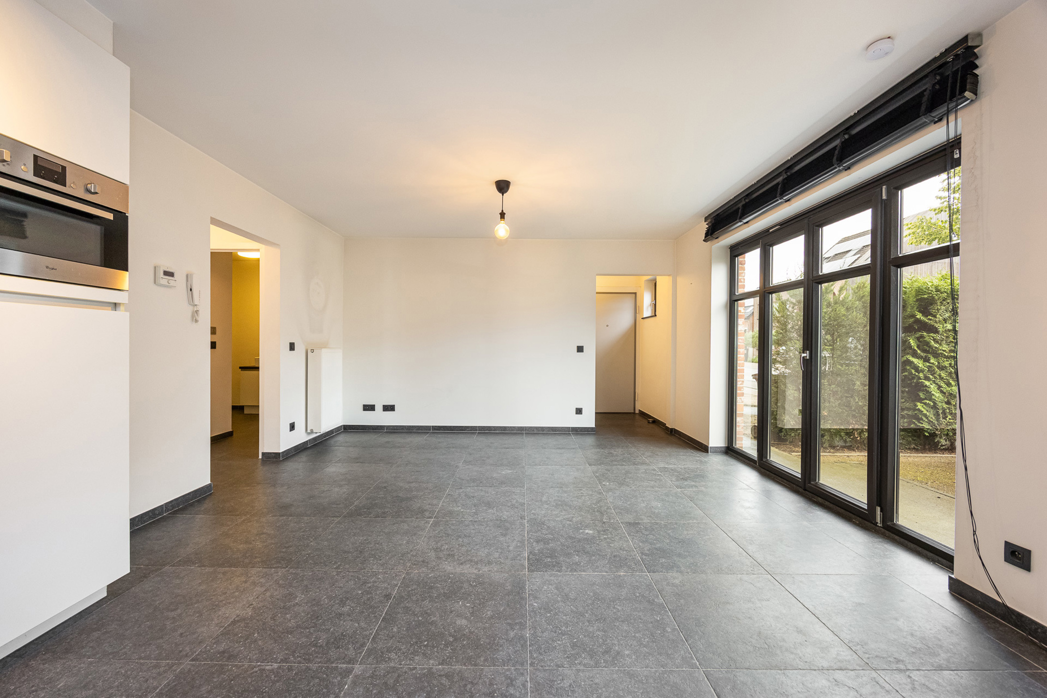 Leuk gelijkvloers appartement met tuintje en autostaanplaats - foto 4