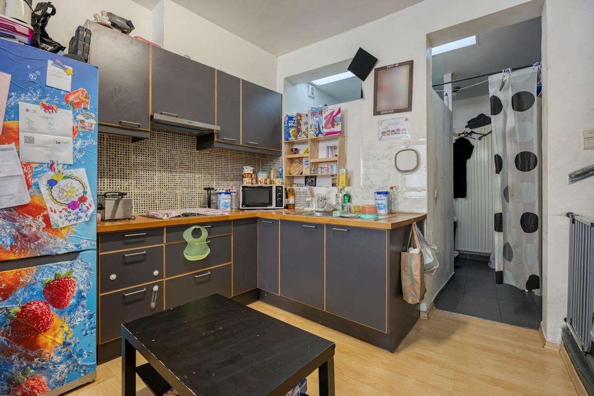 Te renoveren rijwoning met potentieel in Mechelen - foto 5