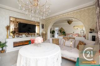 This charming and bright apartment is located in a well-maintained building in the lively Belgicastraat in Brussels. Fully move-in ready, it blends classic elegance with modern comfort, making it perfect for families or as an investment property.<br /><br />Upon entering, you are welcomed into a spacious and light-filled living area, featuring decorative ceilings, elegant chandeliers, and large windows that bring in plenty of natural light. The cosy sitting area connects seamlessly to the dining space, creating a warm and inviting atmosphere.<br /><br />The master bedroom is tastefully decorated and offers a peaceful retreat, while the two additional bedrooms can be used as children's rooms, a home office or guest rooms, depending on your needs.<br /><br />A major asset of this apartment is the practical attic, ideal for use as extra storage space – a rare advantage in an urban setting like Brussels.<br /><br />The location is excellent, within walking distance of shops, schools and public transport, and with easy access to both the city centre and the Brussels Ring.