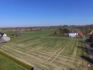 Deze grond is gelegen in Vrijsbeke te Horebeke in woongebied met landelijk karakter en geniet van een landelijke en rustige omgeving.Het perceel...