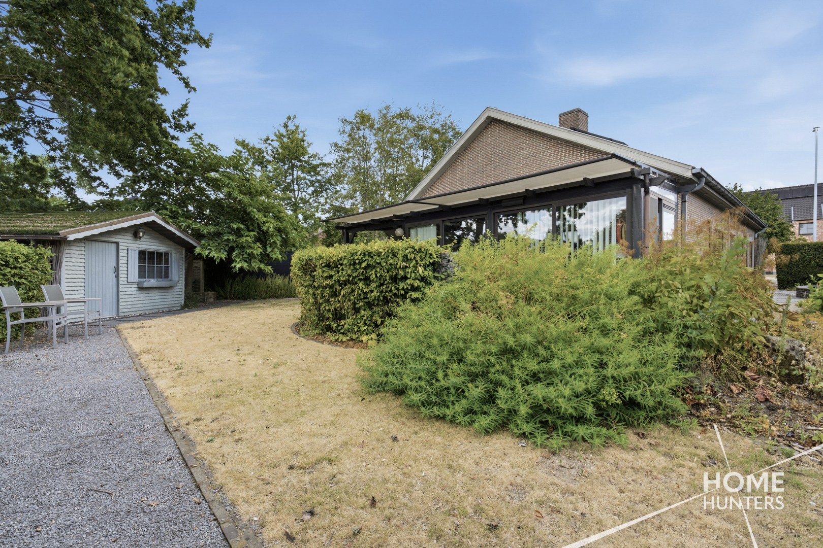 Alleenstaande woning met prachtige tuin en tal van extra troeven in een rustige wijk te Wervik - foto 5