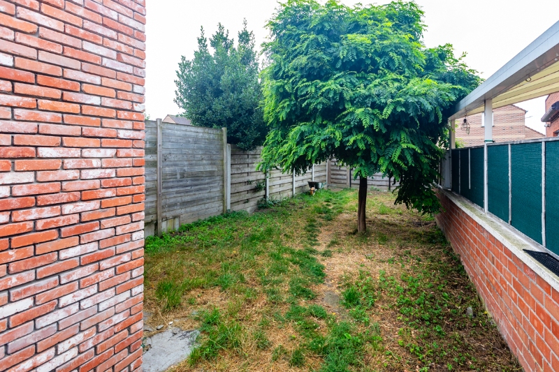 Woning met 2 slaapkamers, tuin, garage en garage- uitweg achteraan (extra parkeerplaats). Energielabel D (bijna C) - photo 4