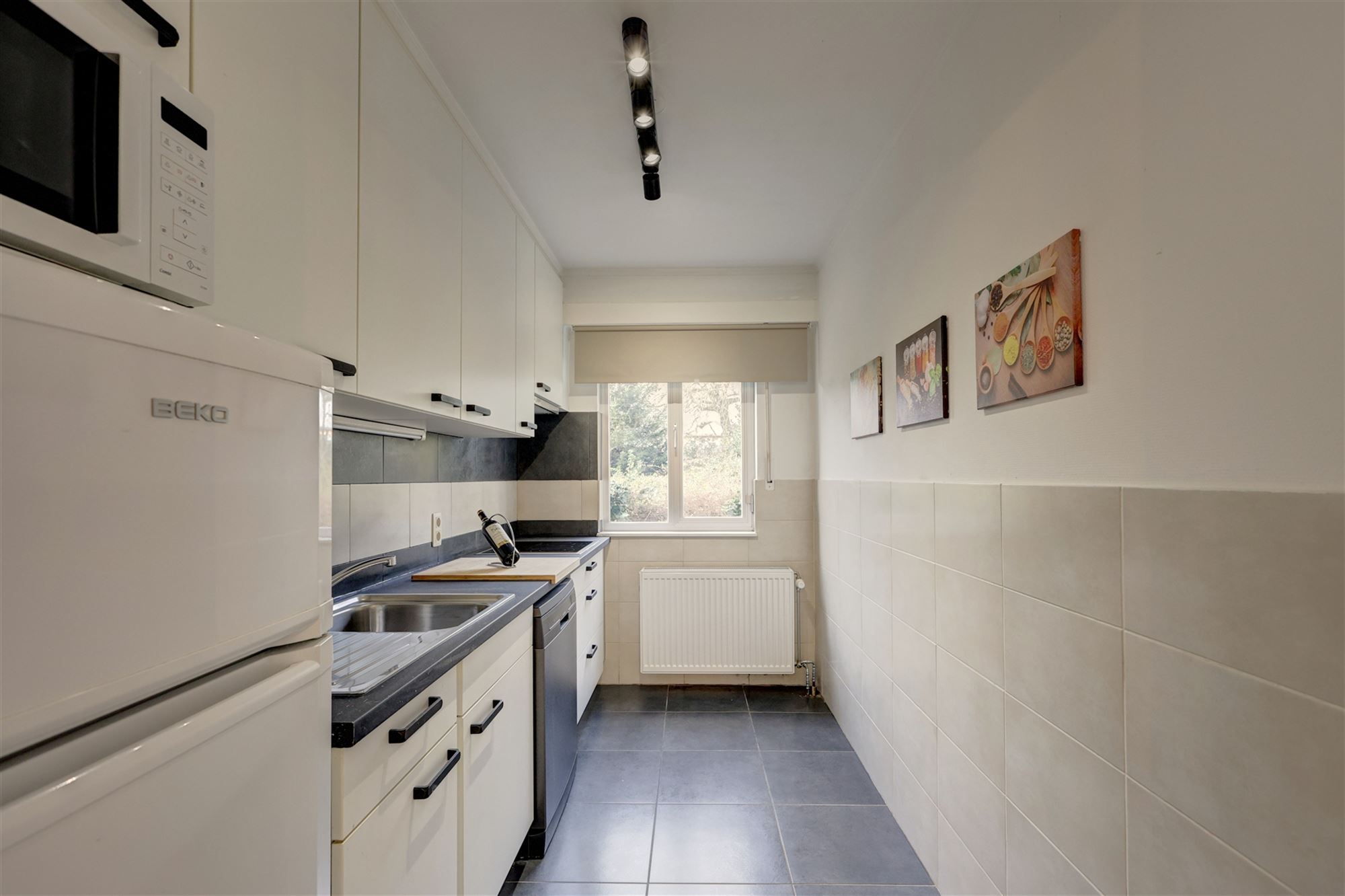 Gelijkvloers appartement met 4 slaapkamers en tuin in centrum Wilrijk - foto 3