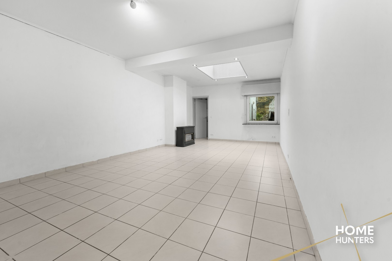 Charmante, op te frissen rijwoning met ruime tuin en 3 slaapkamers - foto 4