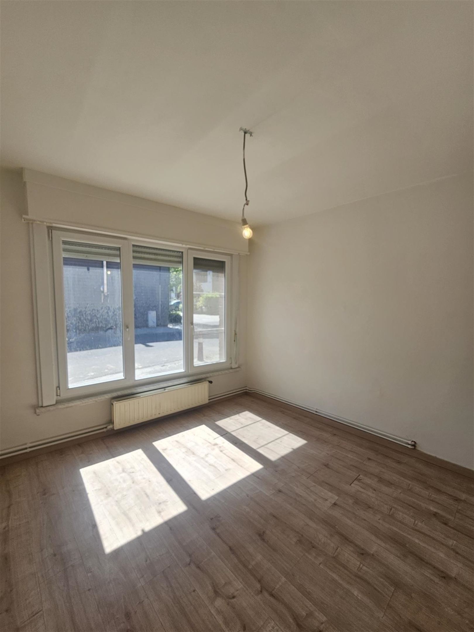Instapklaar gelijkvloers appartement met stadstuintje! - foto 4