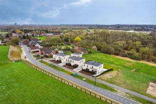 <p><span>Situated on a nature reserve, near the village center of rural Korbeek-Dijle and with a perfect connection to both Leuven and Brussels and other connecting roads, we are honored to offer for sale this modern and timeless new construction project. </span></p><p><span>This contemporary and energy efficient new construction project has been realized by a renowned construction company and concerns 6 semi-detached houses and 1 open house. <br />This newly built house with a facade width of 9 m is situated on a plot of 287 m² and has a living area of 165 m². In a modern and timeless architectural style, this home is finished to a high standard and equipped with all modern living comforts, being underfloor heating throughout, heat pump, solar panels and so much more. This energy efficient property comprises on the ground floor an entrance hall, a guest toilet, a practical storage room, a spacious living room with adjacent dining area with open kitchen which provides access to the garden with terrace of 19 m² where it is lovely to relax. The second floor comprises a bathroom, a separate toilet, a technical storage room and 3 bedrooms. </span></p><p><span>In short, a real opportunity for people who want to live energy efficiently, timelessly, luxuriously and comfortably surrounded by the peace and greenery of the Dyle valley. A unique opportunity! </span></p><p><span> </span></p>
