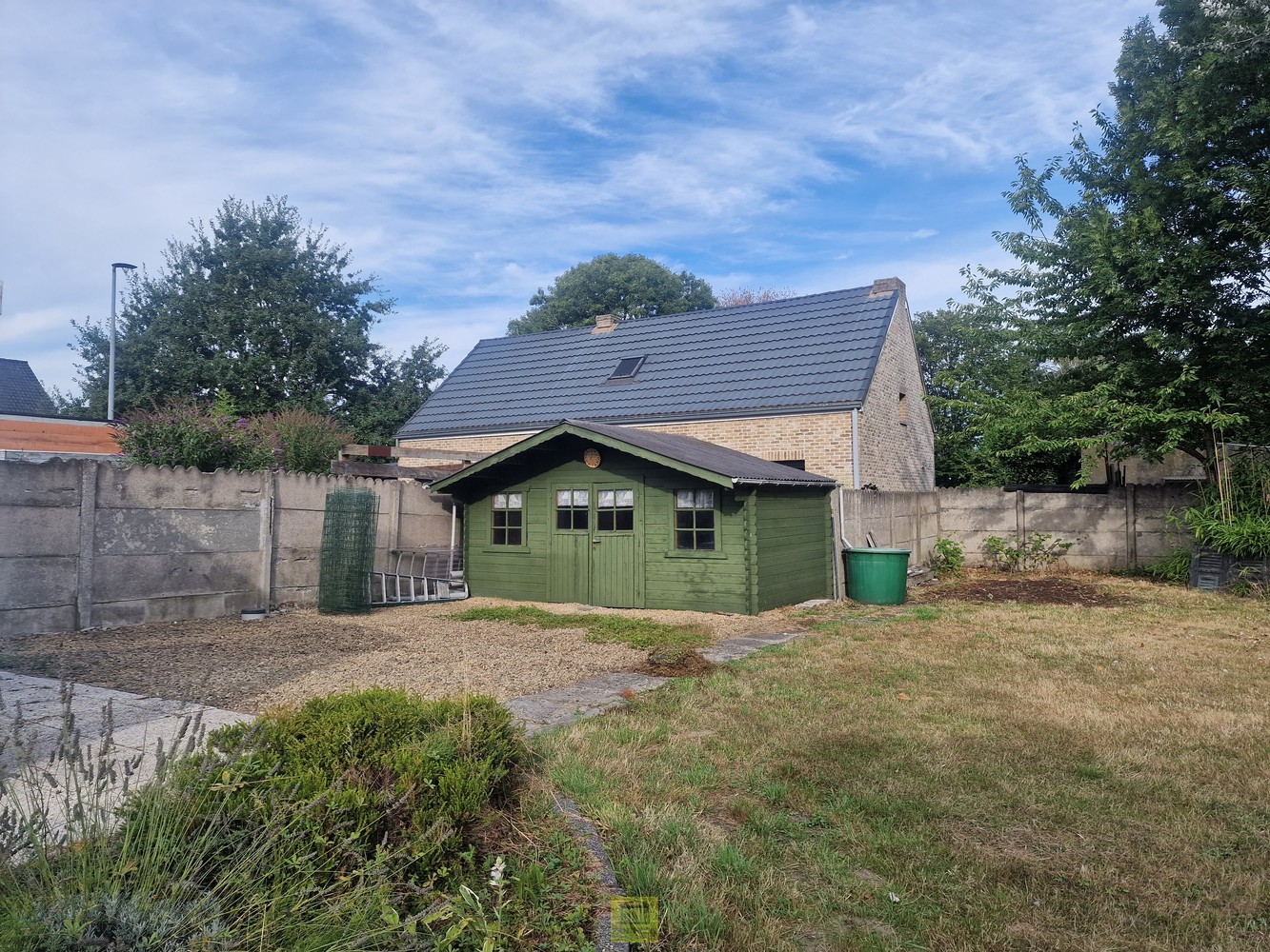Bouwgrond voor open bebouwing met tevens bestaande woning en garage. - foto 5