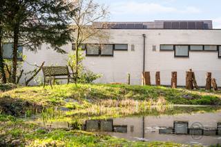 Charmant koetshuis met bijgebouw/extra woonst, unieke binnentuin genietend van een prachtig zicht, en aanpalende bouwgrond met potentieel. In het...