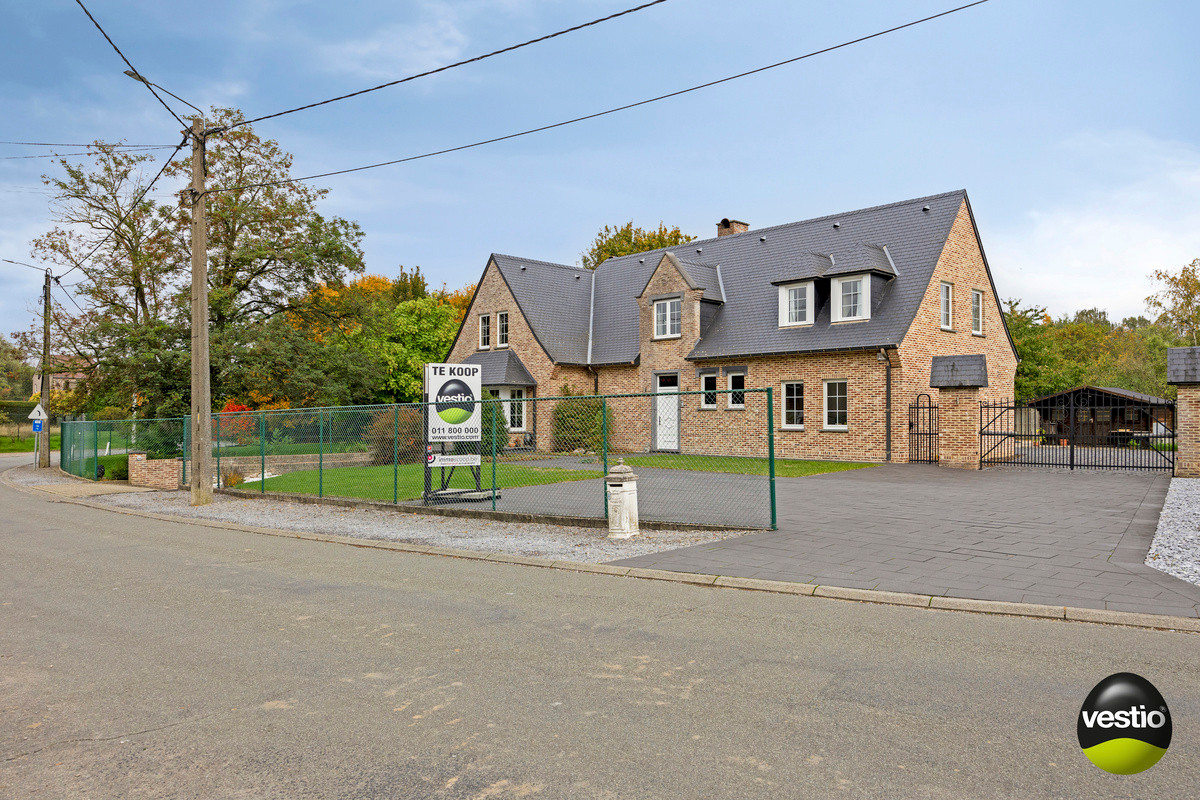 RUSTIG GELEGEN RUIME VILLA MET 5 SLK OP RIANT PERCEEL VAN 18A61CA IN STADSRAND TONGEREN. - photo 1