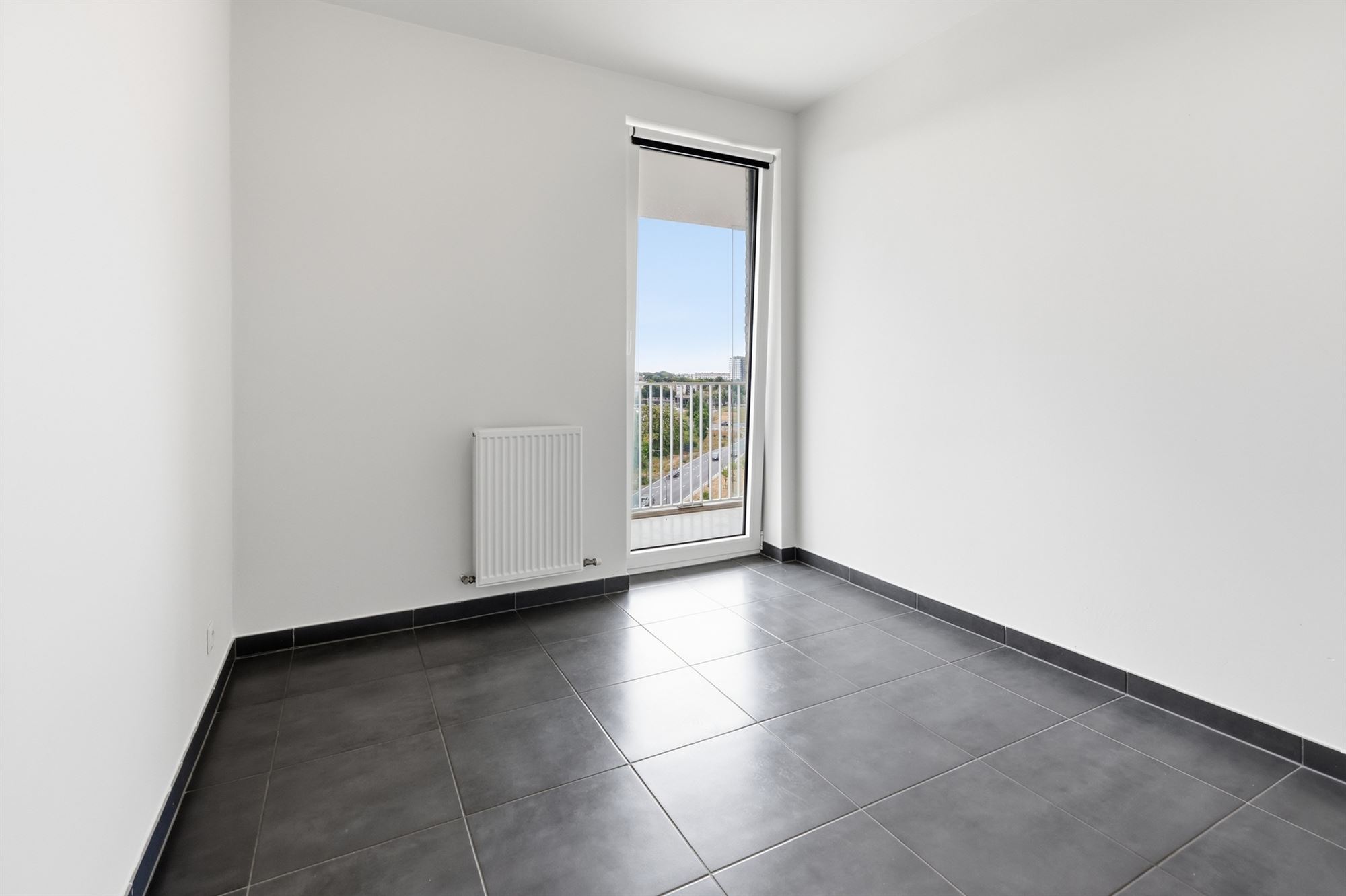 Lichtrijk 1-slaapkamerappartement met ruim terras en staanplaats - foto 5