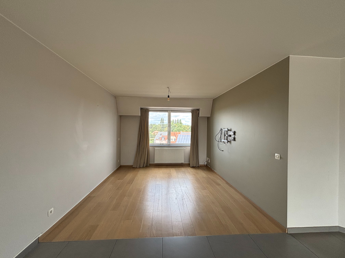 Stijlvol duplex-appartement met zuidgericht terras en ondergrondse garage in Beveren - photo 4