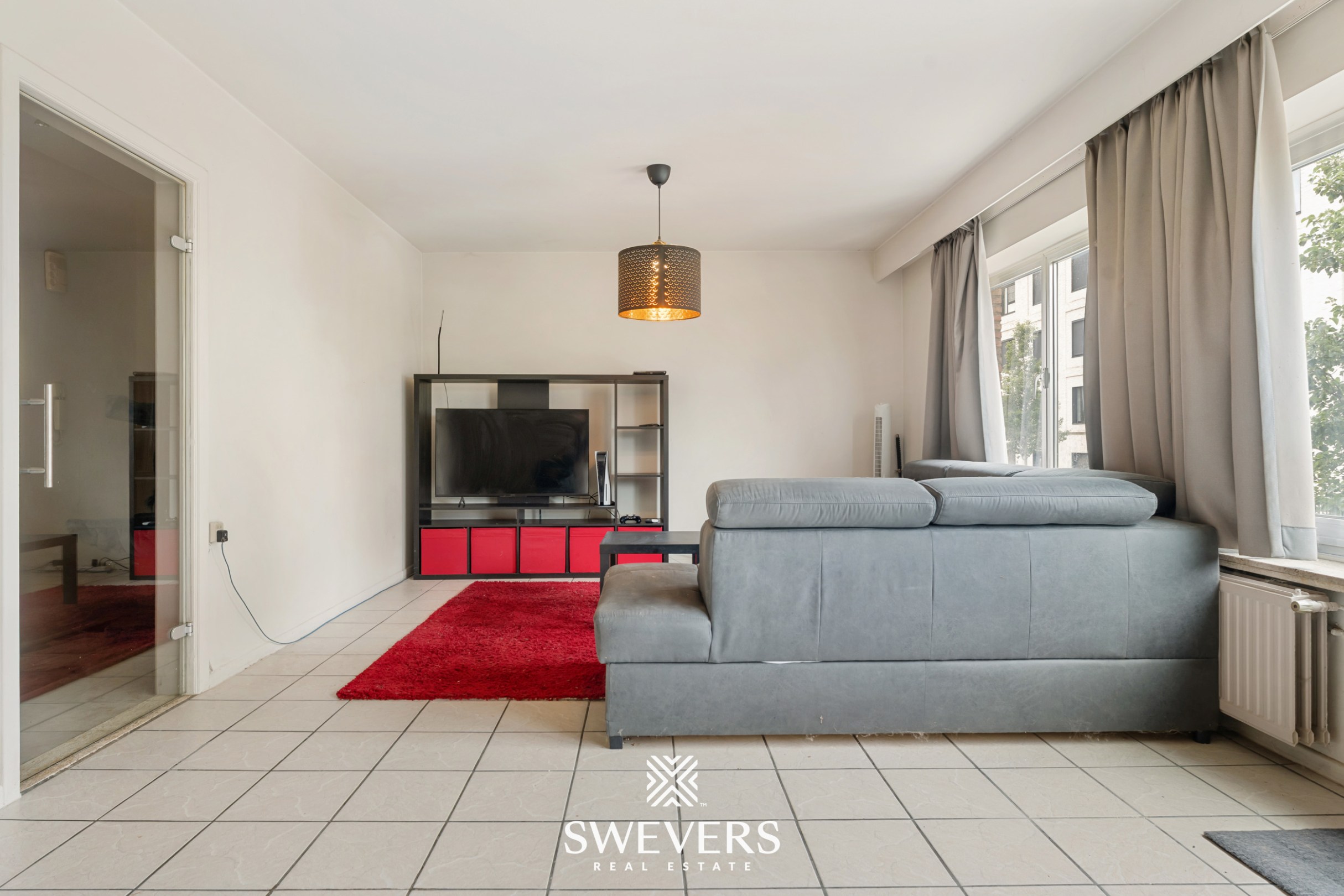 Appartement met 2 slaapkamers, terras en garagebox nabij centrum Beringen - foto 4