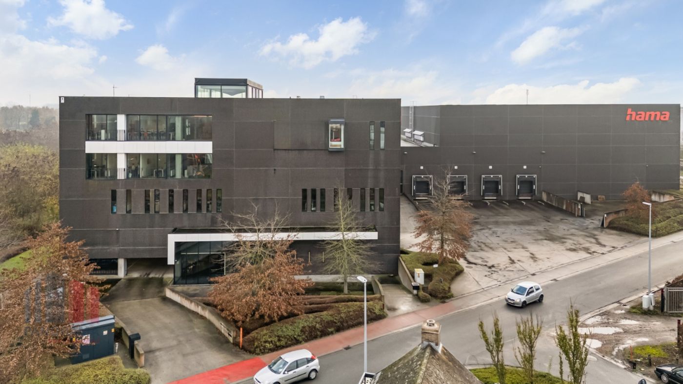 Hoogwaardig bedrijfsgebouw met magazijn en moderne kantoren op toplocatie vlakbij E40 - foto 1