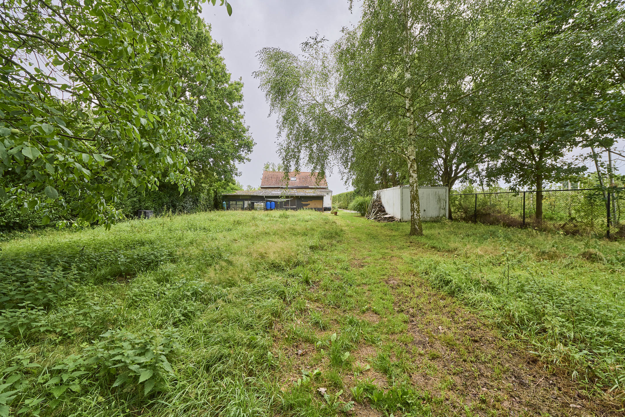 Prachtig gelegen bouwgrond met bestaande woning in het groen - foto 3
