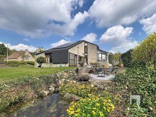 WELKOM IN UW DROOMWONING TE TESSENDERLO-HAM Dit bijzondere pand biedt een unieke combinatie van modern design en natuurlijke omgeving. Gelegen op een...