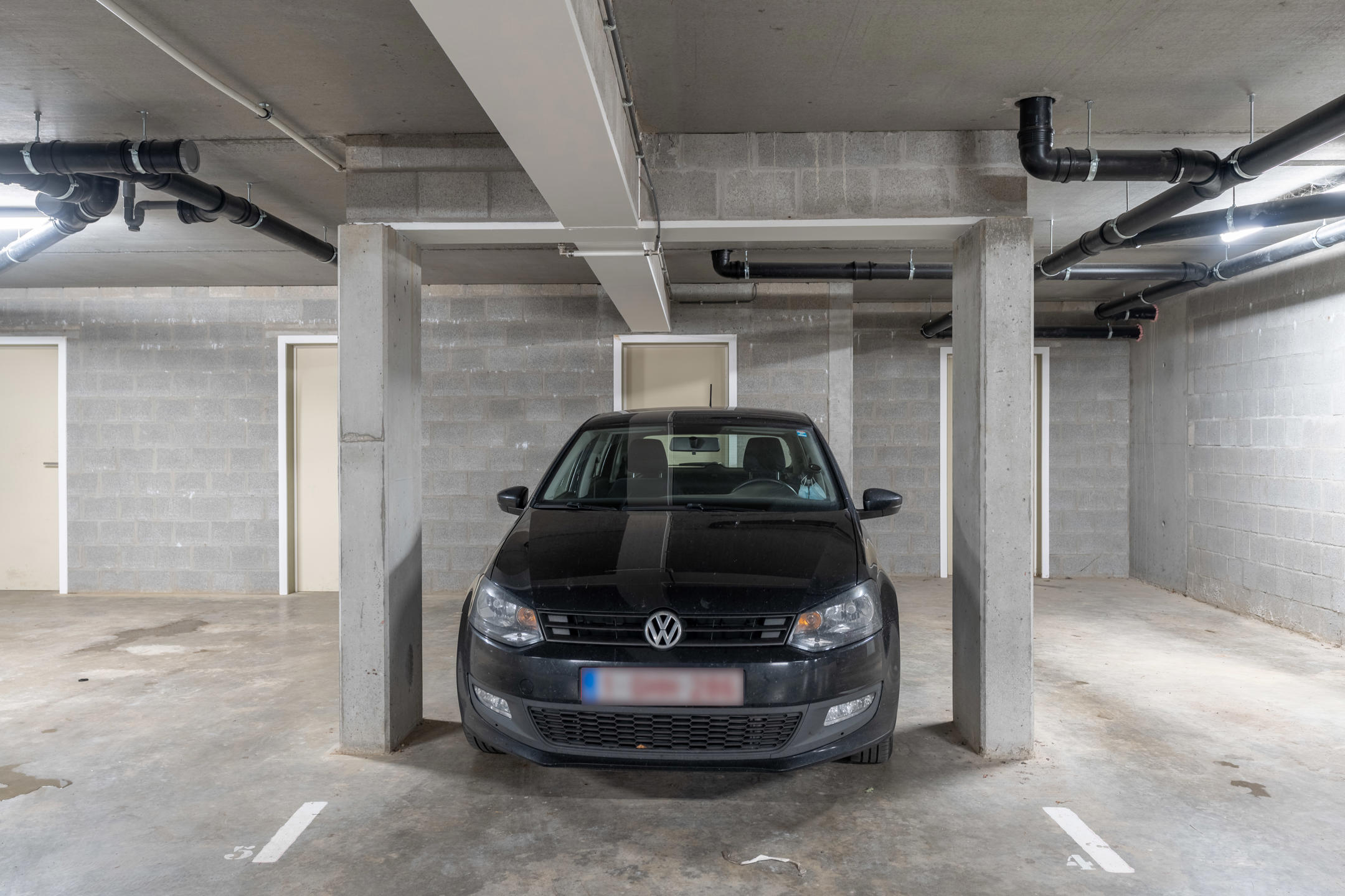 Ondergrondse staanplaats met berging te Poederlee - foto 2