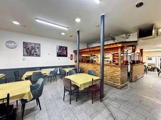 <p><span><strong>Income property with a ground-floor retail space and three apartments | Net return of more than 5%</strong></span></p><p><span>Located in a central and easily accessible area of Antwerp, this versatile investment property represents an attractive opportunity for investors seeking a combination of stable rental income and additional future potential. The property combines a spacious commercial space with three apartments above, ensuring that income is well-diversified across different rental units.</span></p><p><span>The ground floor features a commercial area of approximately 276 m² and is currently set up as a restaurant or bar. At the rear, there is also a spacious multipurpose area of approximately 110 m². This space still needs to be renovated but offers various possibilities depending on its future use. For example, it could be used as storage, a workshop, additional commercial space, or an extension of the existing commercial use. This presents interesting potential for further optimizing the current use and rental income over time.</span></p><p><span>The upper floors contain three spacious apartments. The first-floor apartment has an area of approximately 88 m², as does the second-floor apartment. The penthouse apartment measures approximately 75 m². The combination of the three residential units with the commercial ground floor provides an attractive mix of rental income and a good balance across the property.</span></p><p><span>The property currently generates a net rental yield of more than 5%, making it an attractive option for both experienced investors and buyers seeking an income-generating property with a solid foundation and additional long-term potential.</span></p><p><span>Significant technical investments have also already been made. For example, the roof was completely renovated in 2026 and fitted with new roofing and no less than 12 cm of roof insulation. In addition, the apartments have favorable EPC ratings, which positively impacts the property’s rental potential and overall investment profile.</span></p><p><span>The location is a major additional asset. The building is centrally located in Antwerp, with shops, public transportation, and major access roads in the immediate vicinity. The center of Antwerp and Park Spoor Noord are also easily accessible. Thanks to this central location, there is strong demand for both commercial and residential spaces, which benefits the rental potential of the various units.</span></p><p><span>In other words, this income-generating property combines an attractive current yield with an interesting commercial use, three leased or leasable apartments, and additional potential thanks to the multipurpose space at the rear. A versatile investment in a central Antwerp location with room for further optimization.</span></p>