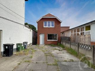 Leuke woning te koop op een perceel van 1 are 50 in het centrum van Ramsel!Deze gezellige woning heeft op het gelijkvloers een leefruimte (opgedeeld...