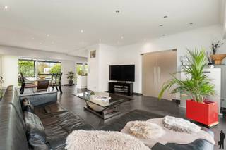 Instapklare woning met tuin, garage en kelderruimte in Sint-Katelijne-WaverBESCHRIJVING:Instapklare woning met moderne uitstraling en praktische...