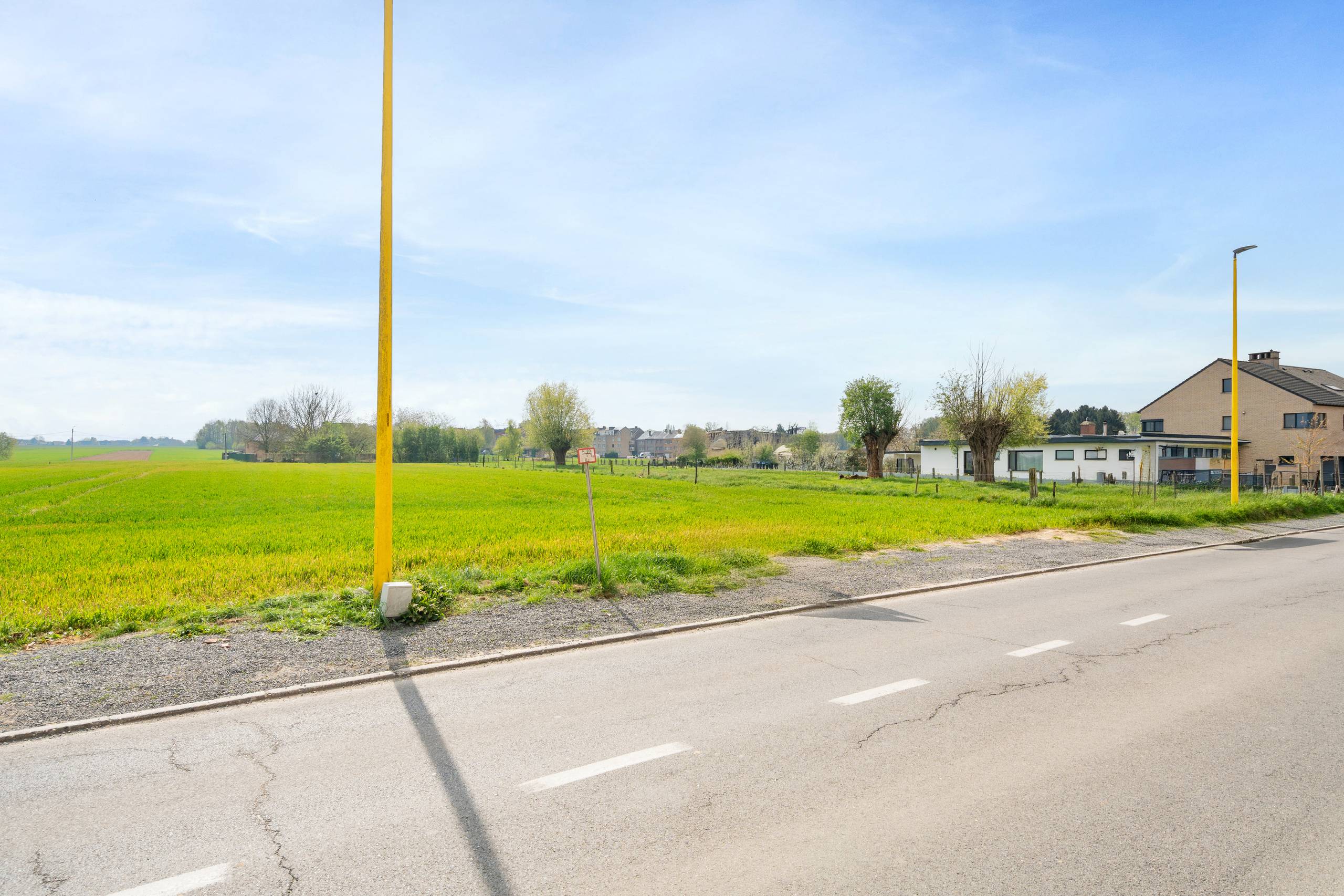 Zuidgerichte bouwgrond tussen velden te koop in Grimbergen - foto 3