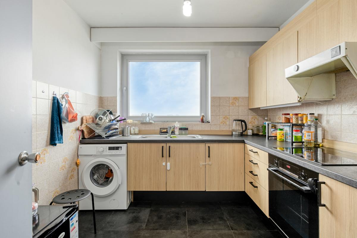Appartement prêt à emménager au 13e étage à Borgerhout ! - photo 5