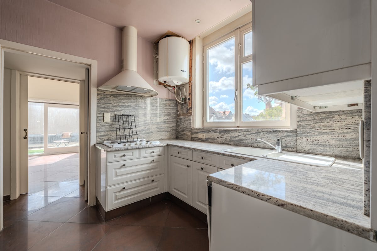 Hoekhuis met veel potentieel te koop te Mariakerke - foto 4