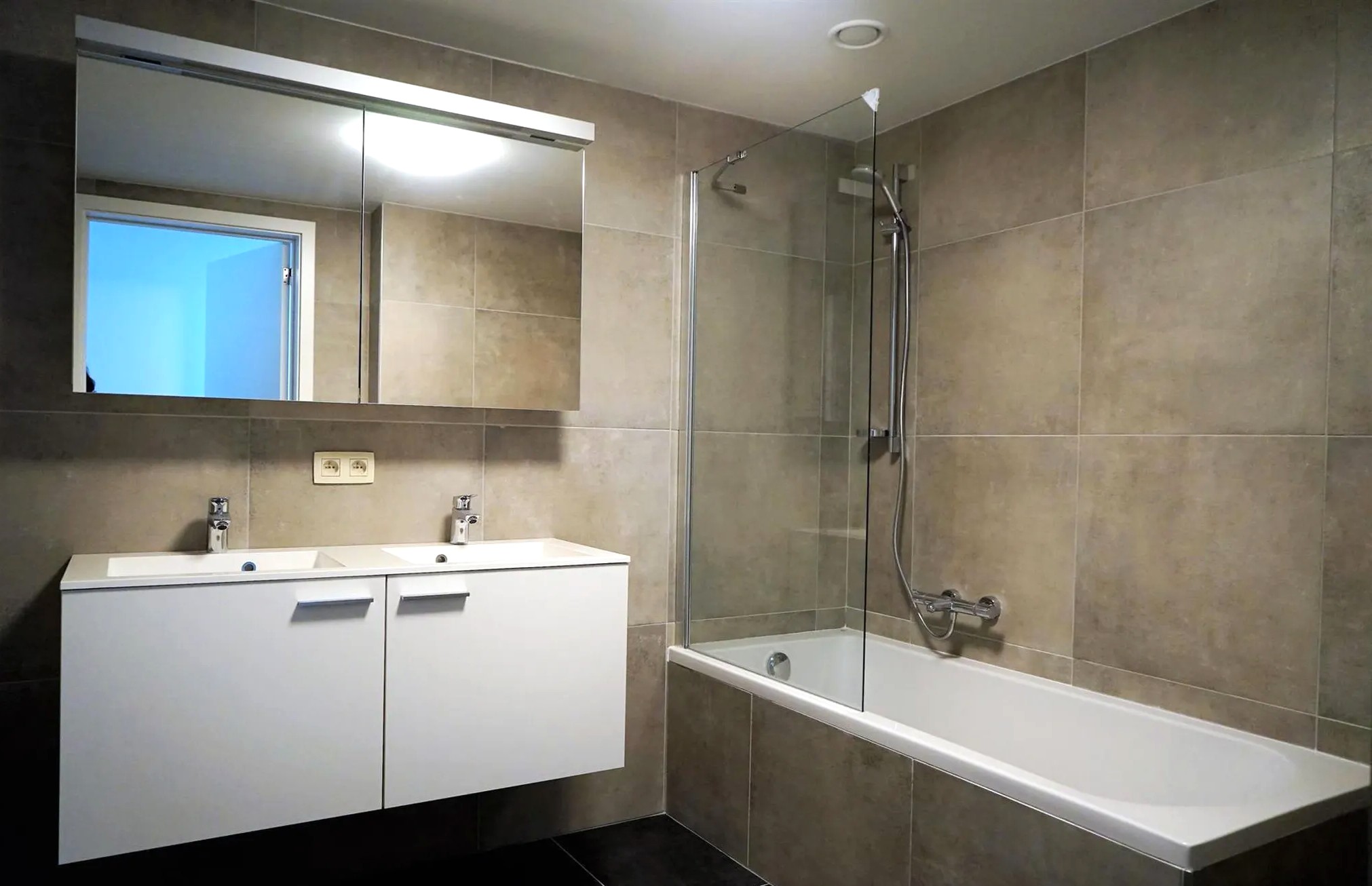 Gelijkvloers appartement met tuin en staanplaats - foto 4