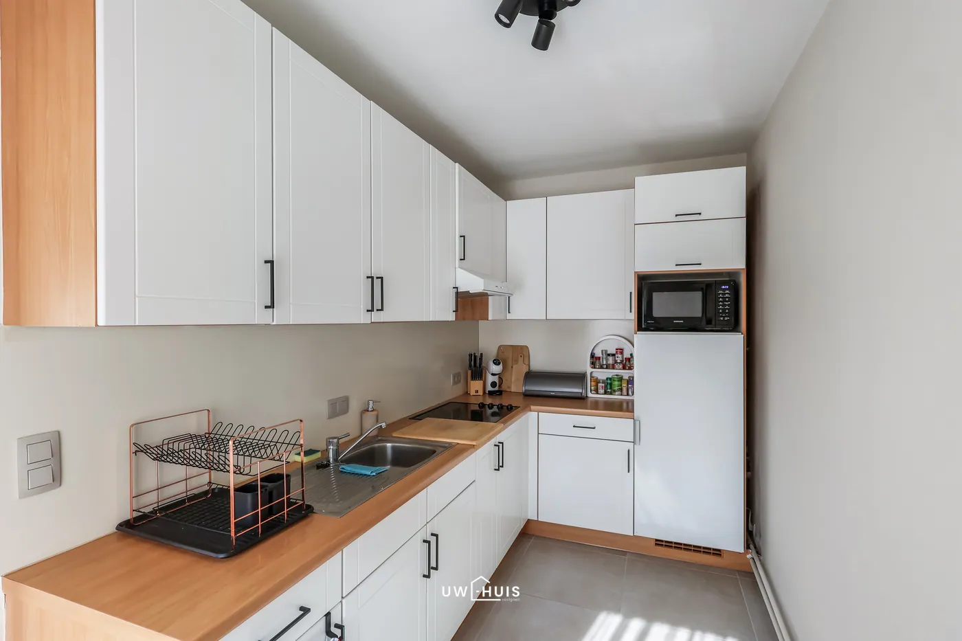 Instapklaar gelijkvloers appartement met tuin, garage en extra staanplaats in het centrum van Puurs - foto 4