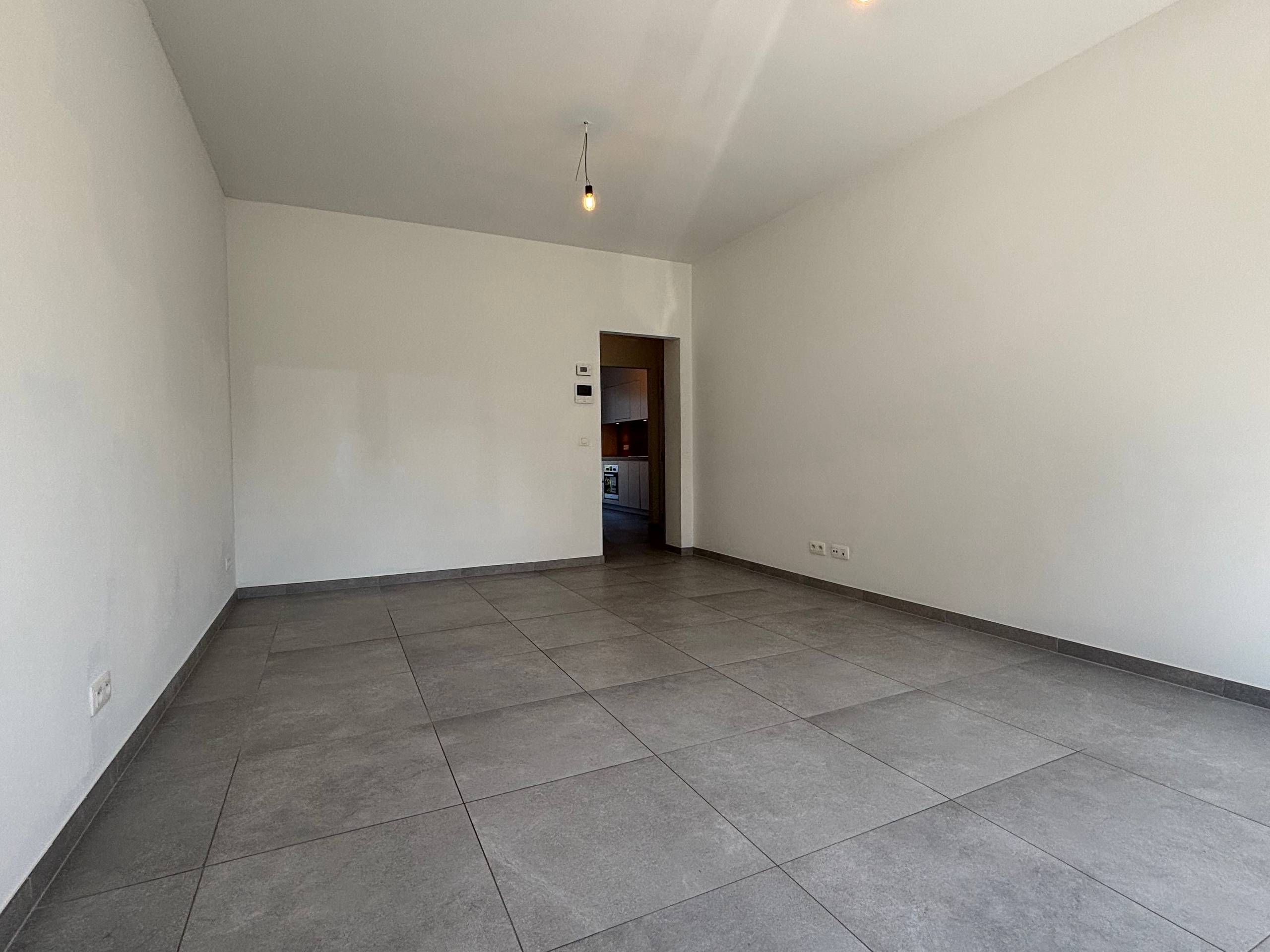 Instapklaar gelijkvloers appartement met terras en autostaanplaats in Zottegem - foto 4