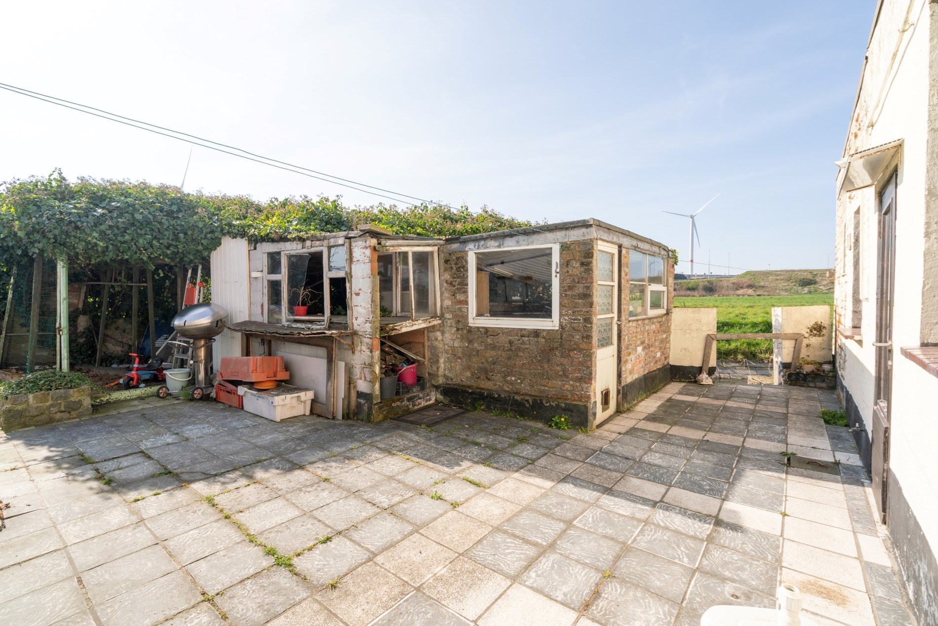 Hoekwoning met een perfect georiënteerde tuin te Lissewege - foto 3