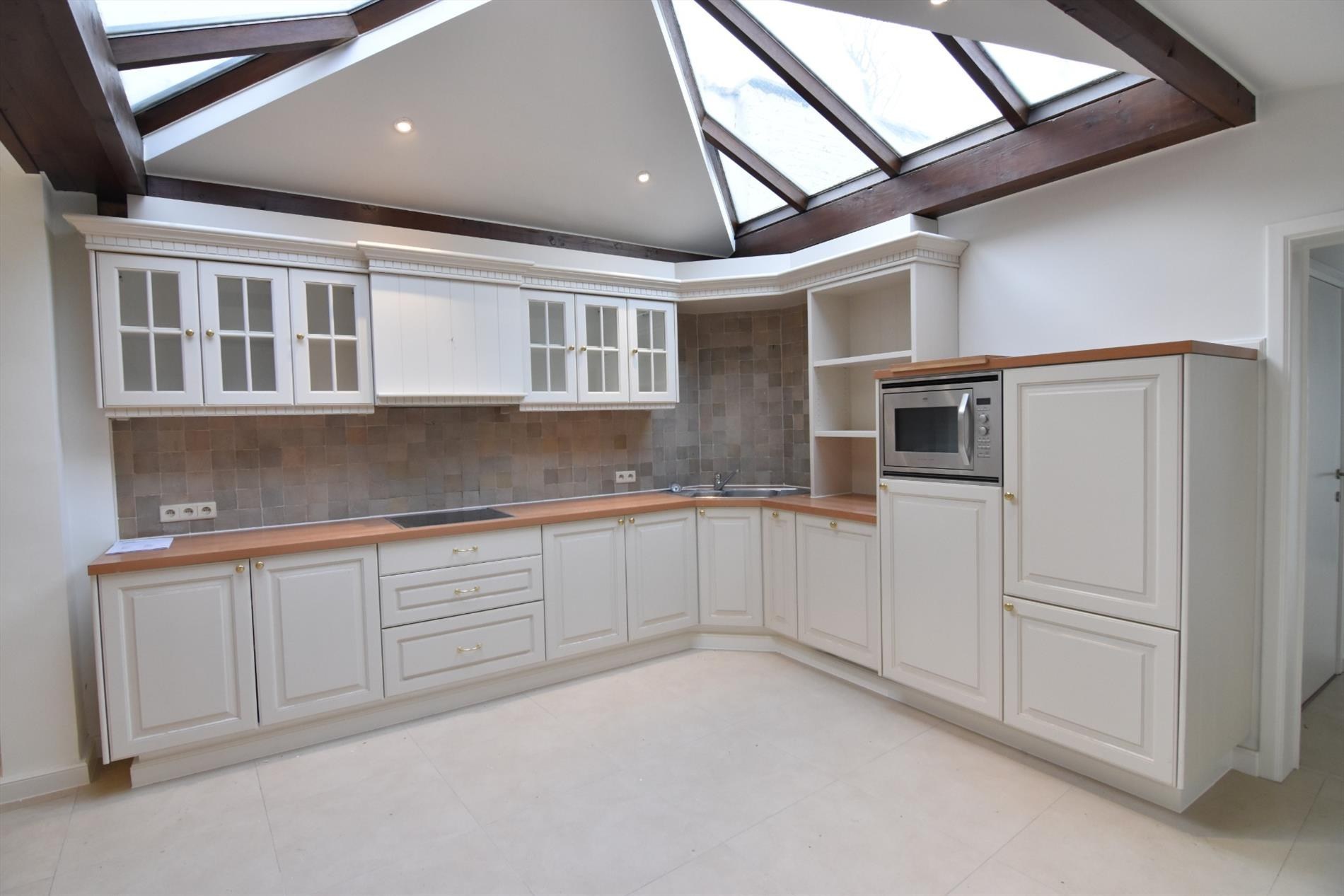 Gelijkvloersappartement met ruime tuin - foto 5