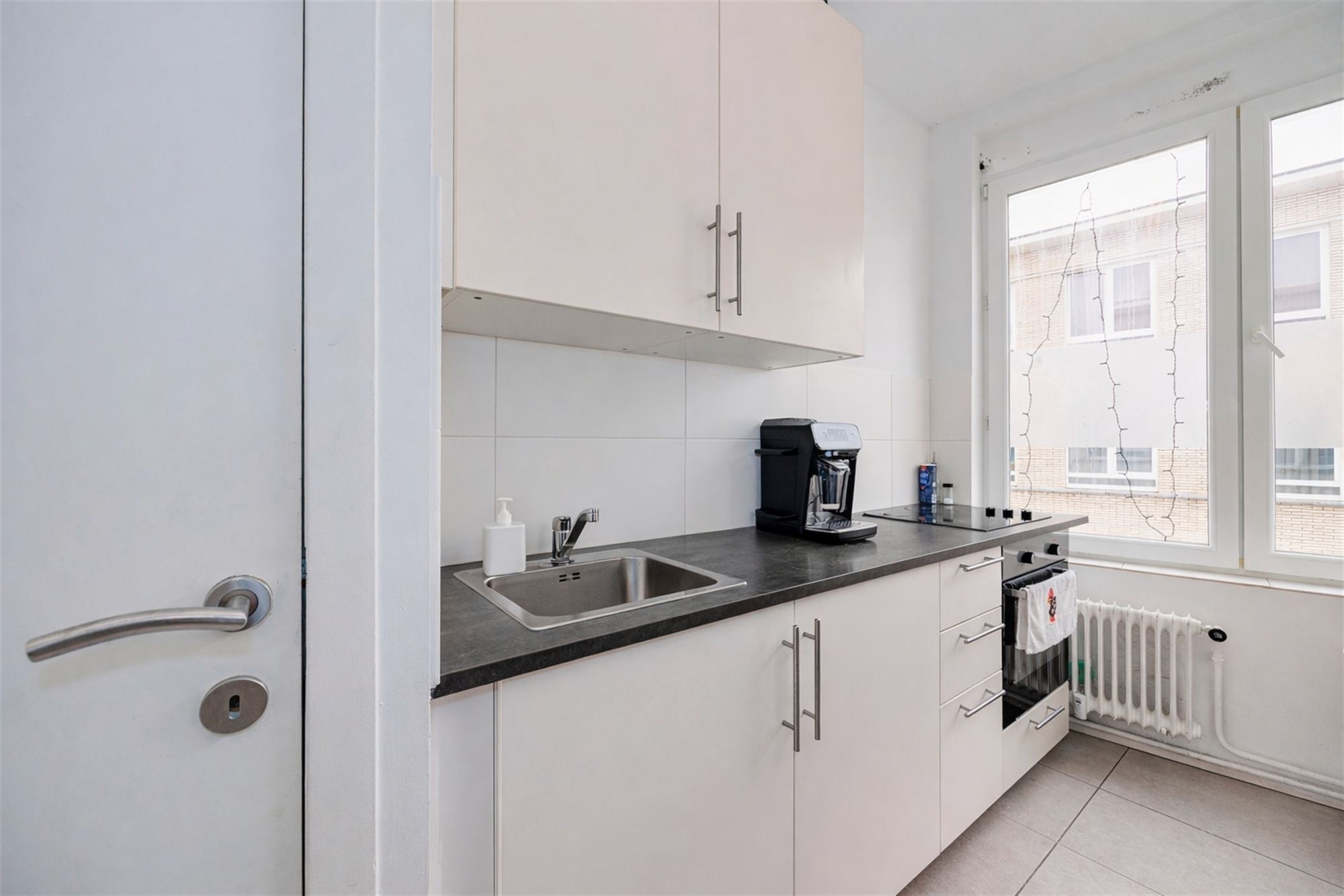 Licht hoekappartement met 1 slk aan het oude Gerechtsgebouw - foto 5