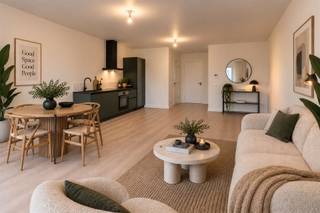 <p><b>Elegant Modern Apartment in Heart of Antwerp</b></p><p>Discover this stunning 63m² apartment located in vibrant Antwerp, offering contemporary comfort and style. This well-designed residential space spans 69m² total and features smart utilization of every square meter, making it an ideal choice for discerning buyers seeking modern urban living.</p><p><b>Key Features:</b></p><p>The property boasts <b>1 spacious bedroom</b> with beautiful views overlooking the lively Antwerp cityscape, including picturesque sightlines toward the historic city center. Large windows flood the space with natural light, creating an inviting and bright atmosphere.</p><p>The <b>open-plan kitchen and living area</b> showcases contemporary design with a sleek built-in kitchen featuring modern appliances, including a gas cooktop and integrated oven. The warm wooden flooring throughout creates a cohesive, welcoming aesthetic that flows seamlessly from the living spaces into the bedroom areas.</p><p><b>Bathroom & Facilities:</b></p><p>A <b>modern, well-appointed bathroom</b> features distinctive cork-textured walls with contemporary fixtures, including a rainfall shower and elegant basin. The bathroom design combines functionality with sophisticated style.</p><p><b>Building Amenities:</b></p><p>The building provides <b>secure, professional facilities</b> including accessible stairwells with modern white railings and emergency safety equipment, ensuring resident comfort and security.</p><p><b>Location & Views:</b></p><p>Positioned on an upper floor, this apartment offers <b>exceptional panoramic views</b> of Antwerp's vibrant cultural district, with direct sightlines to the famous Plaça square and surrounding architectural landmarks. The location provides excellent access to shops, restaurants, and cultural attractions.</p><p>This contemporary apartment represents an outstanding opportunity for those seeking stylish, modern living in one of Belgium's most dynamic cities.</p>
