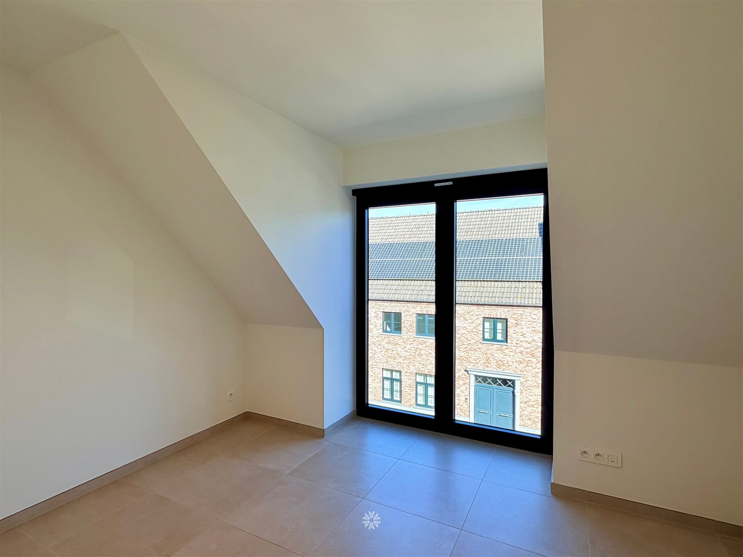 Lichtrijk appartement met 2 slaapkamers, garage en tuin te huur in centrum Destelbergen - foto 5