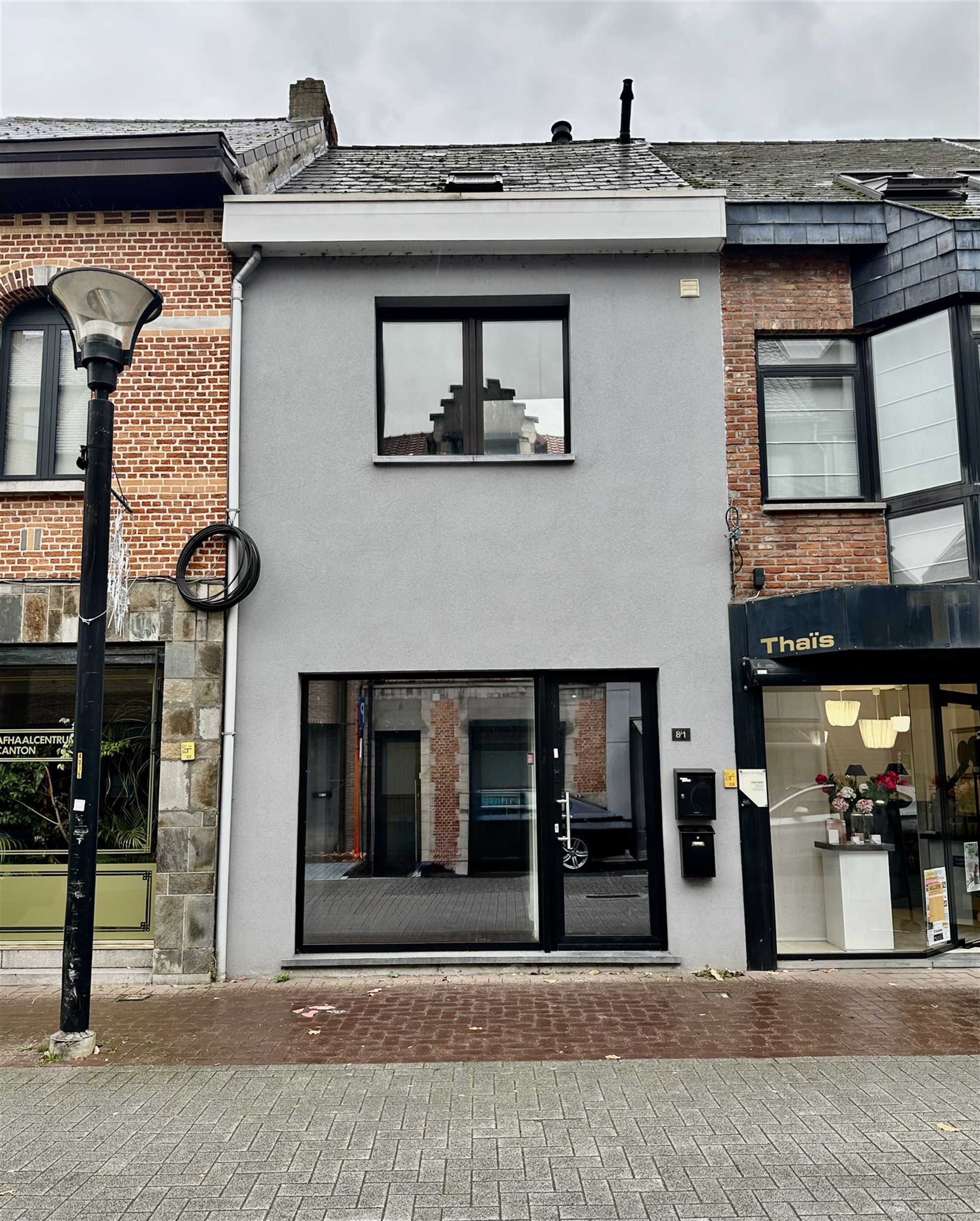 Handelsruimte met duplex appartement en tuin. - foto 1