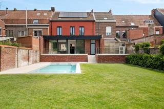 Deze energetisch gerenoveerde woning (2024 met E-peil 23) met een hoogwaardige afwerking op slechts 5 minuten wandelen van de Leie te Wervik...