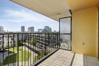 This contemporary building combines comfort with a top location in one of the most dynamic and up-and-coming neighborhoods in Antwerp. Located on the edge of the renewed Eilandje and a stone's throw from the green Park Spoor Noord, you can enjoy easy accessibility and a vibrant urban environment that is in full bloom. All facilities, access roads and the historic city center of Antwerp are nearby. This 2017 apartment offers a living area of 87 m² and is an ideal home for those who love city life combined with rest. If you are looking for a quality building in Antwerp, this property is definitely worth a visit.<br /><br />Apartment layout:<br />- entrance hall<br />- bright and cozy living space<br />- open, equipped kitchen<br />- south-facing terrace of approximately 8 m² with a relaxing view of the well-kept courtyard<br />- 2 full bedrooms<br />- third room, perfect for use as a desk, dressing room or children's room<br />- bathroom with a double sink, shower and bath<br />- separate toilet<br />- convenient storage in the apartment<br />- extra basement storage<br /><br />Advantages of this apartment:<br />- Energy-efficient and recent new construction complex from 2017<br />- Excellent and popular location near the Eilandje and Park Spoor Noord<br />- Lovely south-facing terrace with a green view<br />- Possibility to purchase an underground car park for €25,000<br /><br />Are you interested in this ready-to-move-in apartment for sale in Antwerp? Then be sure to contact us. If you would like to sell your own property, please contact us for a free estimate, by phone at 03/206.76.76 or by email to antwerpen@dewaele.com.<br /><br />Register of measures: no