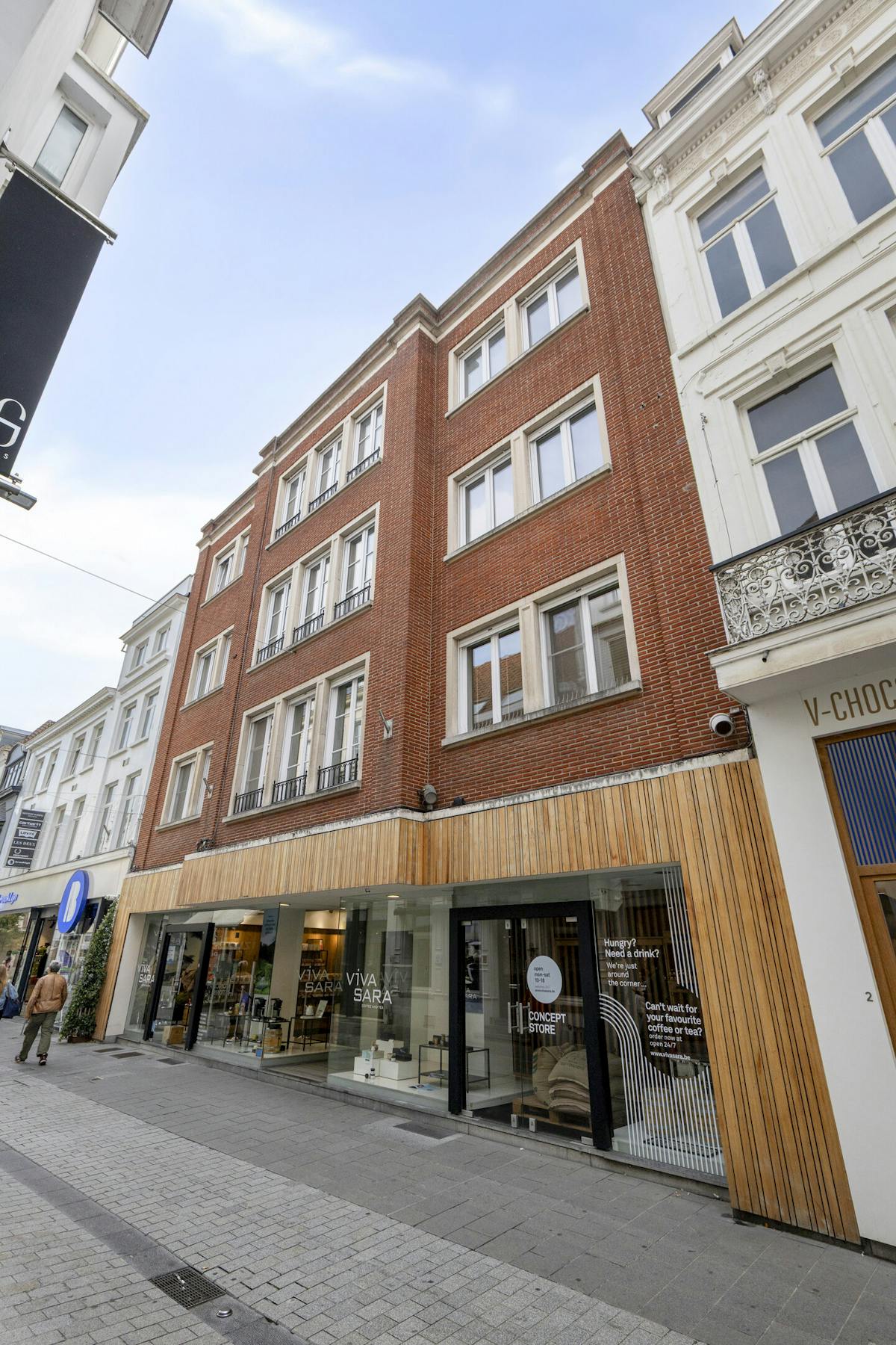 Patrimoniumvennootschap met handelspand en 2 appartementen - foto 1