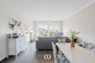Are you looking for a spacious and centrally located apartment with two bedrooms and over 100 m² of living space in Oudenaarde? Your search ends here!<br /><br />This property boasts an ideal location just a stone's throw from the city center and all essential amenities. The large, bright rooms and the cozy terrace are just a few of the many highlights this apartment has to offer.<br /><br />LAYOUT:<br /><br />You enter the apartment through the hallway, which provides access to the spacious living room and kitchen. The apartment also features two full-sized bedrooms, a bathroom, a separate toilet, and a practical storage room.<br /><br />Additionally, you can enjoy a charming terrace, perfect for relaxing outdoors on sunny days.<br /><br />Does this spacious apartment seem like the perfect fit for you? Don’t hesitate to contact us today to schedule a viewing!