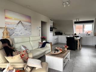 This recent apartment has an area of 110m² and is located in the center of Otegem. It consists of an entrance hall with separate toilet, a...