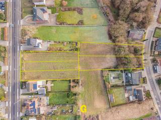 Dit aanbod omvat drie percelen grond die samen in aanmerking komen voor verkaveling in vijf loten geschikt voor halfopen woningen dan wel 1 open en...