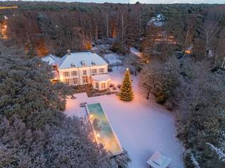 Beautiful fully renovated Vlassak Verhulst villa with swimming pool, wellness area, and orangery on approximately 6,629 m² in ’s-GravenwezelLocated...