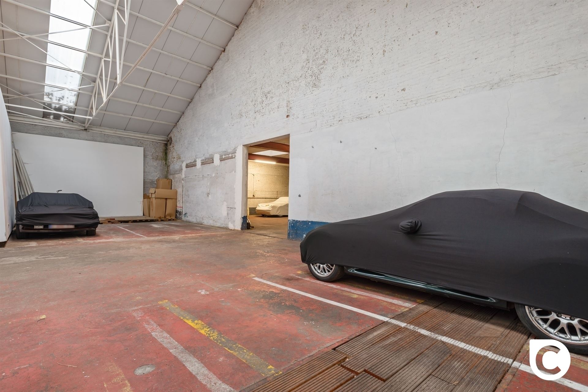 Uniek magazijn van 450 m² met showroom & woning - foto 4