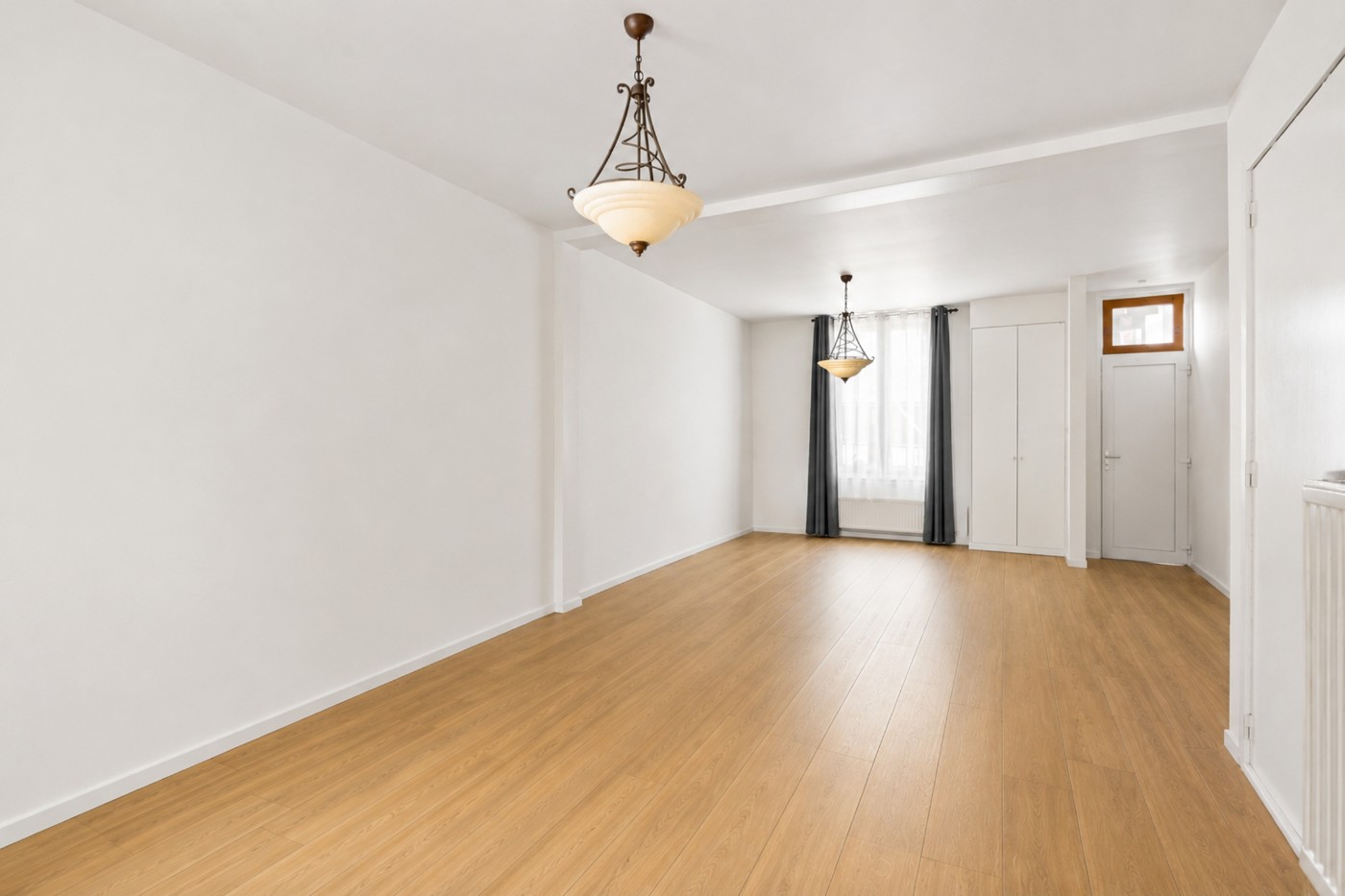 Instapklare gezinswoning met 3 slaapkamers, ruime tuin en tal van mogelijkheden - foto 2