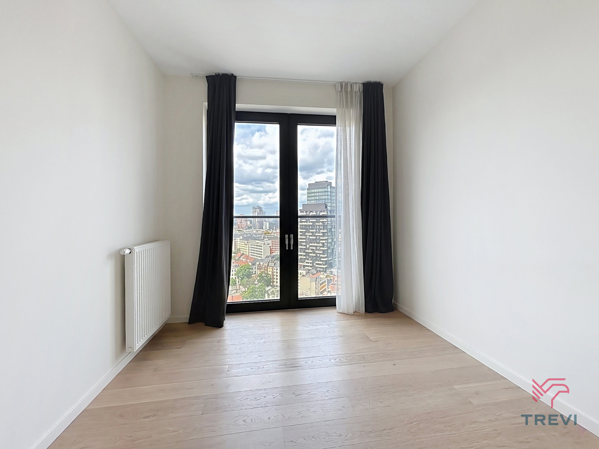 APPARTEMENT OP DE 21STE VERDIEPING IN DE EUROPESE WIJK ! - foto 4