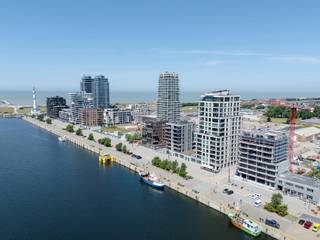 Gelegen aan de Hendrik Baelskaai bieden wij dit exclusieve appartement aan met een subliem zuidwestgericht terras van 33 m², waar je geniet van...